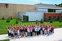 Group of people in front of YMCA building
